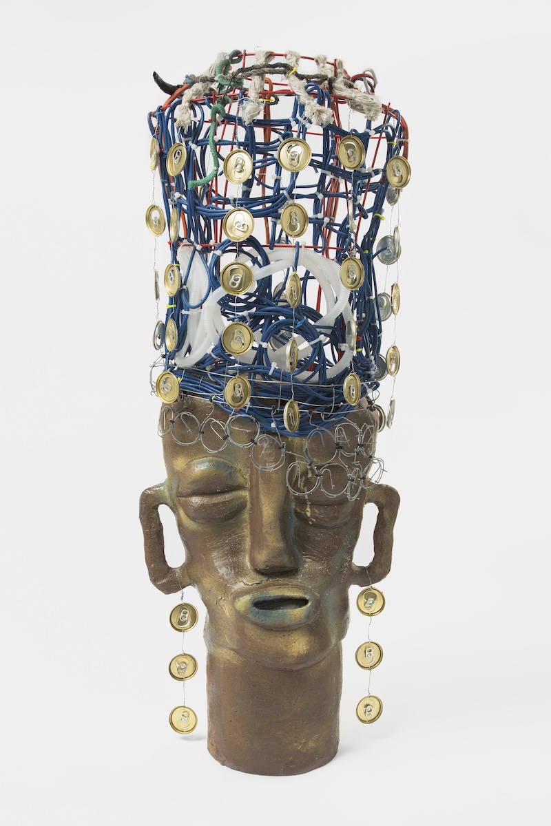 Leilah Babirye, Senga Muzanganda (Auntie Muzanganda), 2020 Glazed ceramic, wire and found objects, 55” x 22.5” x 17.2”. Property of a Private Collection, Boston Photo by Greg Carideo. Courtesy of the artist, Stephen Friedman Gallery, London and New York and Gordon Robichaux, New York